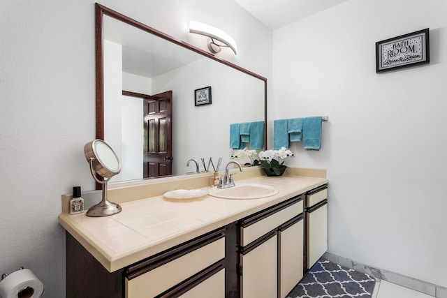 bathroom featuring vanity and tile patterned flooring