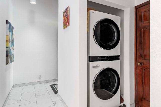 washroom with stacked washer and clothes dryer