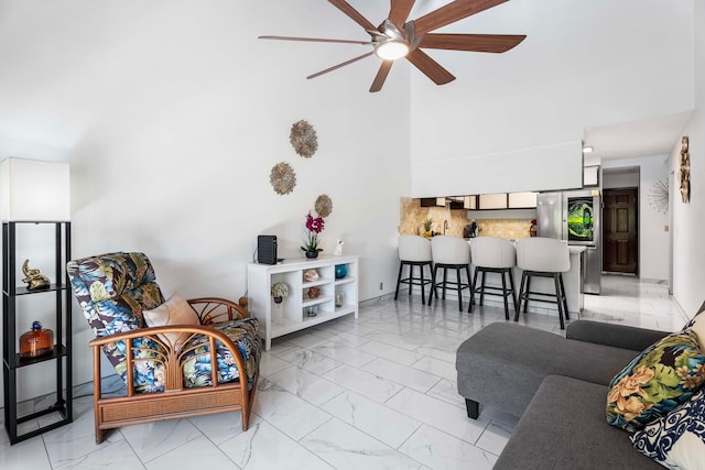 living room featuring ceiling fan