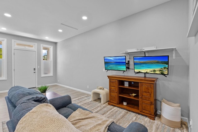 living room with light hardwood / wood-style floors