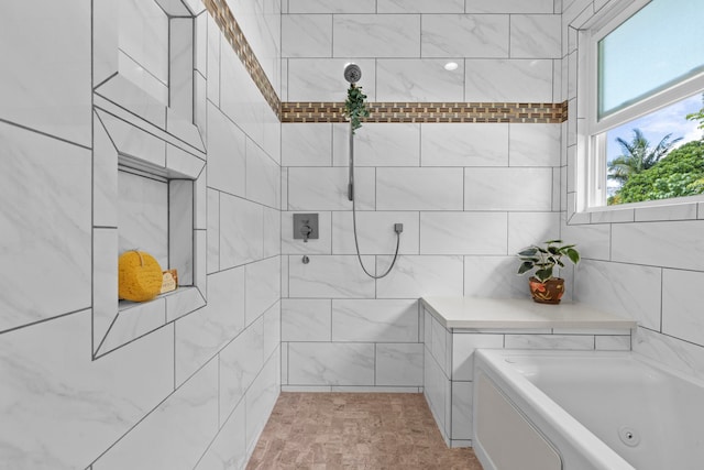 bathroom featuring independent shower and bath and tile walls