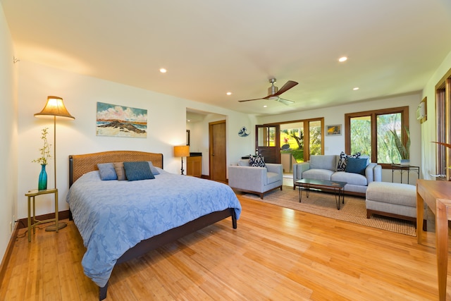 bedroom featuring ceiling fan and light wood-type flooring