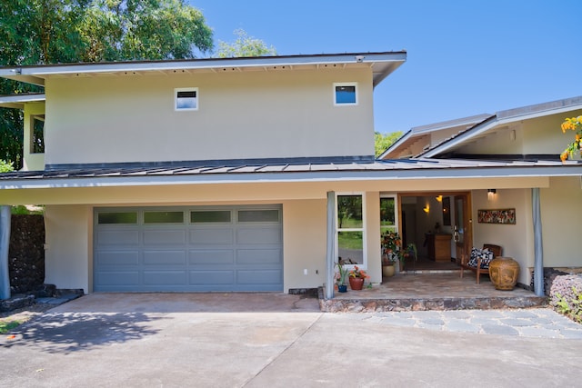 view of front of home featuring a garage