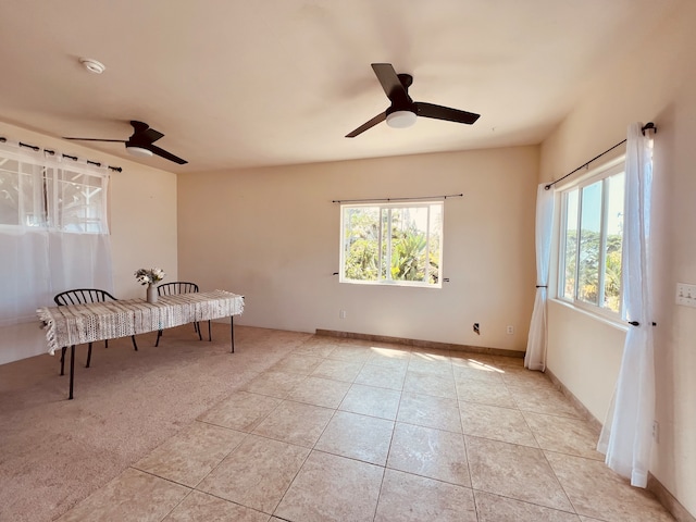 interior space featuring ceiling fan