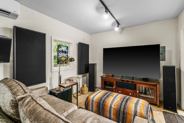 3707 Omao Rd, Koloa, HI 96756 - living room with wood finished floors, a wall mounted AC, and rail lighting