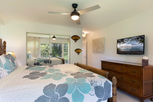 bedroom featuring a closet, carpet flooring, and ceiling fan