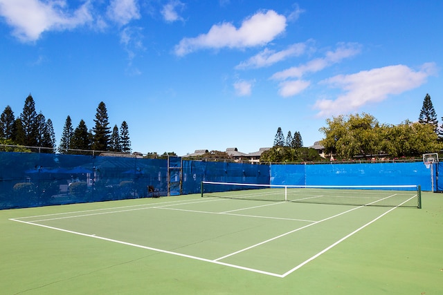 view of tennis court with basketball court