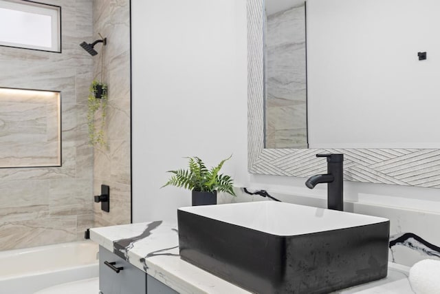 full bathroom featuring vanity and shower / washtub combination