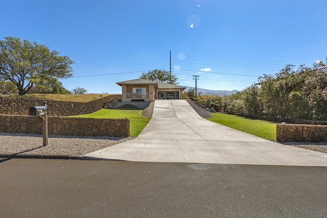 single story home with a front yard