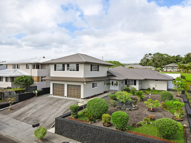 view of front of property featuring a garage