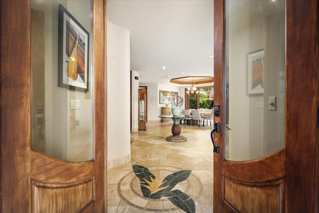 interior space featuring an inviting chandelier