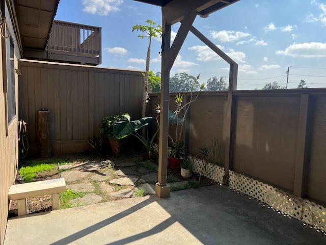 view of patio with a balcony