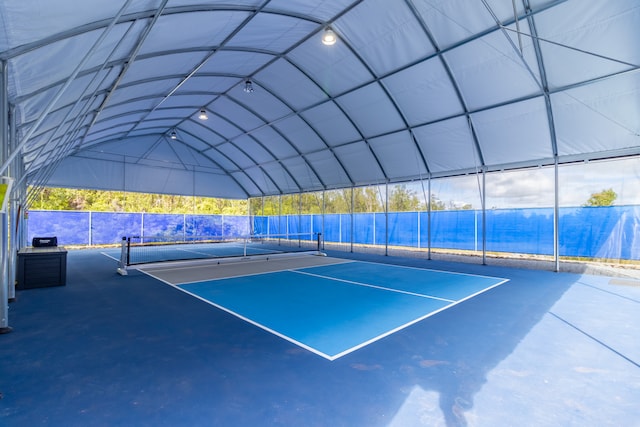 view of tennis court with basketball court