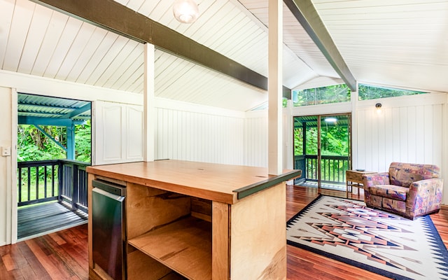 kitchen featuring lofted ceiling with beams and dark wood-type flooring