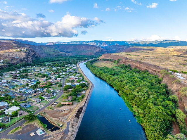 aerial view with a water and mountain view