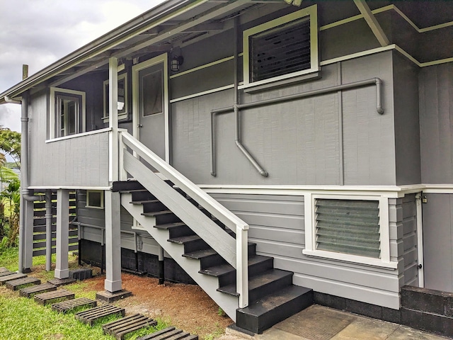 view of home's exterior with stairs