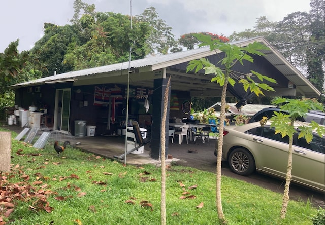 view of car parking with a yard