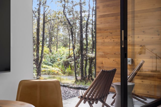 interior space featuring wooden walls