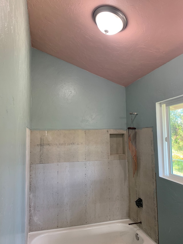 bathroom with concrete flooring