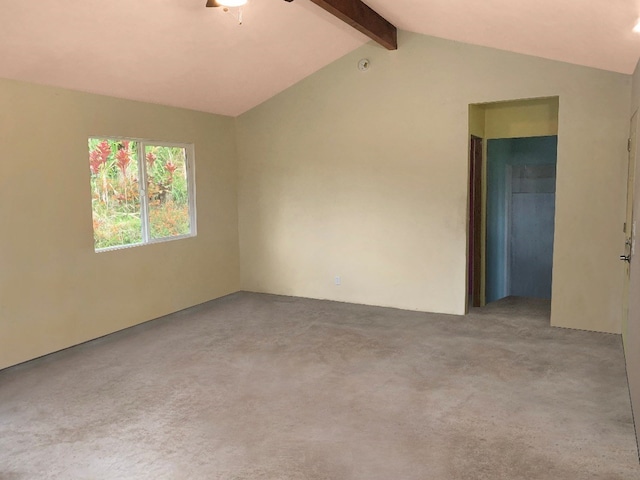 carpeted spare room with vaulted ceiling with beams and ceiling fan