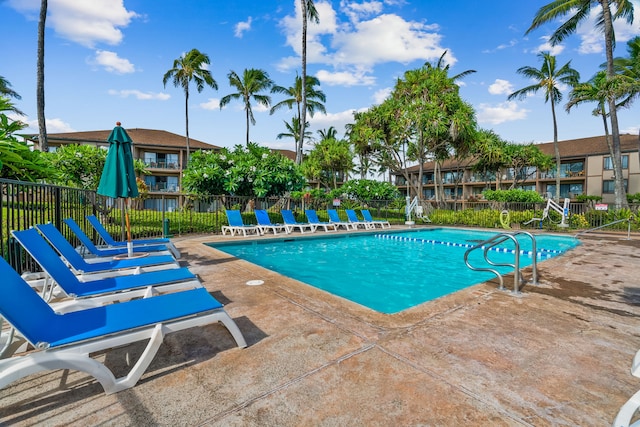 view of swimming pool with a patio area