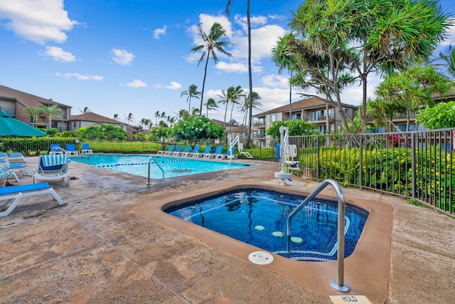 view of pool featuring a community hot tub