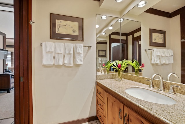 bathroom with vanity and tile patterned floors