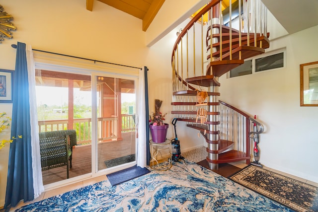 interior space featuring vaulted ceiling with beams