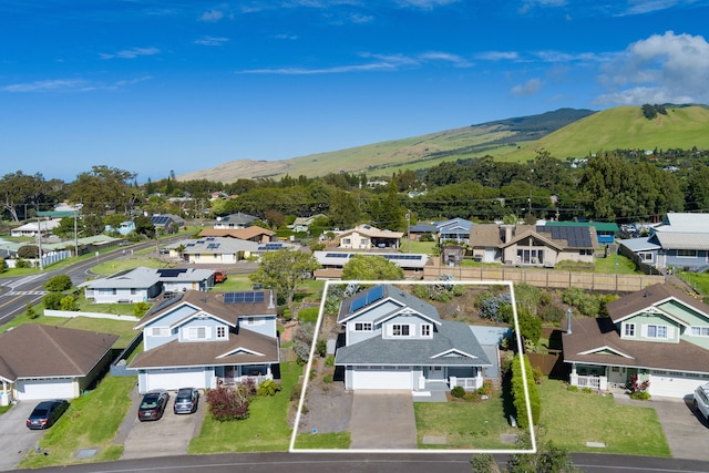 bird's eye view with a mountain view