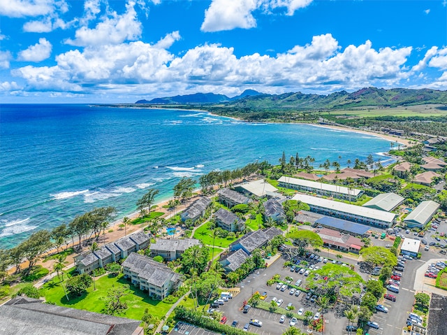 birds eye view of property featuring a water and mountain view