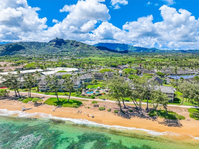 birds eye view of property with a beach view and a water and mountain view