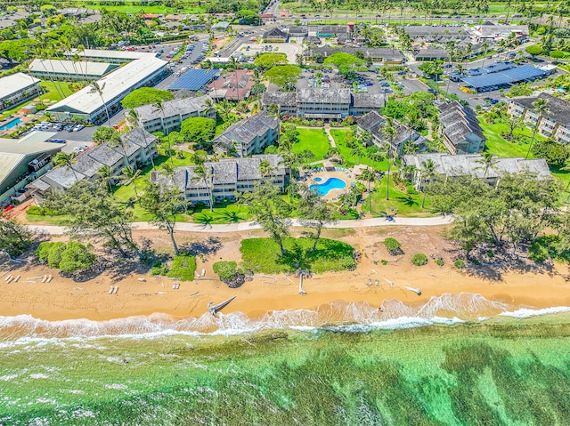 aerial view with a beach view and a water view