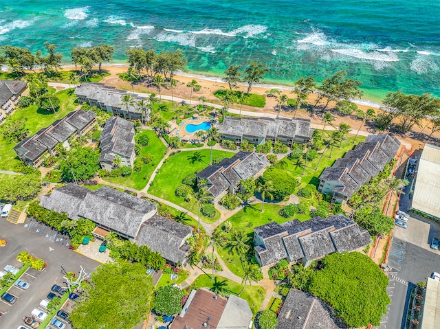 bird's eye view with a view of the beach and a water view