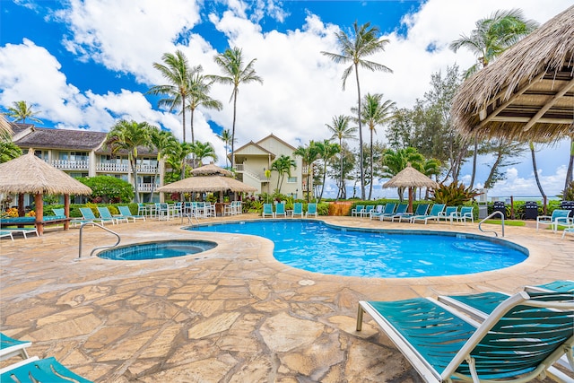 view of swimming pool with a gazebo, a patio, and a hot tub