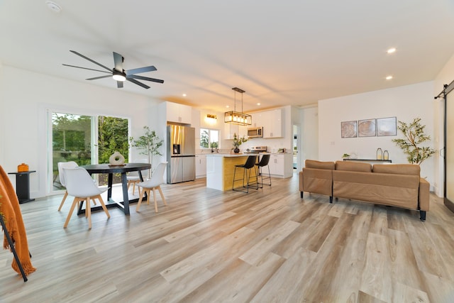 16-2157 Jewel Dr, Pahoa, HI 96778 - living room featuring recessed lighting, plenty of natural light, light wood-type flooring, and ceiling fan