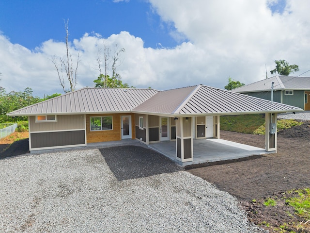 16-2157 Jewel Dr, Pahoa, HI 96778 - view of front of property featuring metal roof, driveway, and a carport