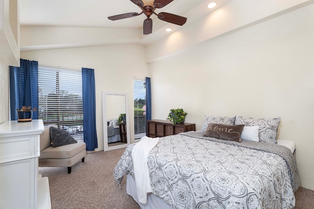 carpeted bedroom with lofted ceiling and ceiling fan