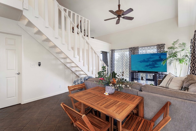 tiled living room with ceiling fan