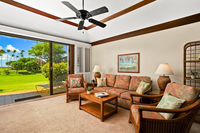 carpeted living room featuring vaulted ceiling and ceiling fan