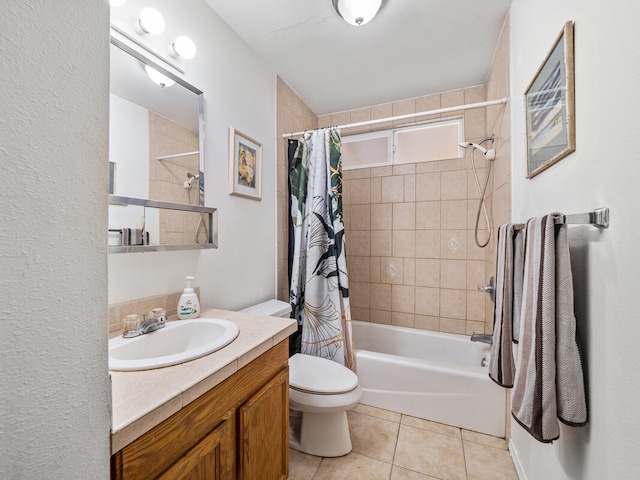 full bathroom with tile patterned flooring, vanity, shower / tub combo with curtain, and toilet