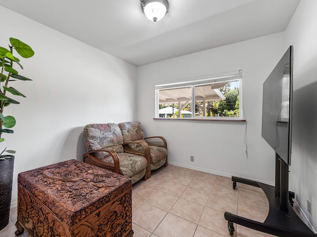 living area featuring light tile patterned floors