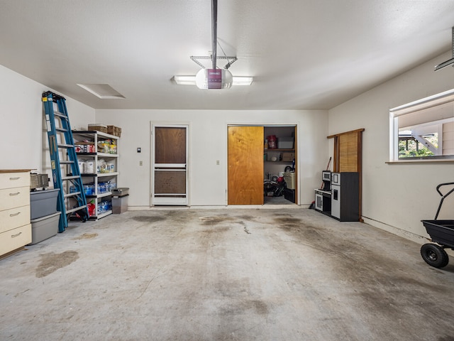 garage featuring a garage door opener