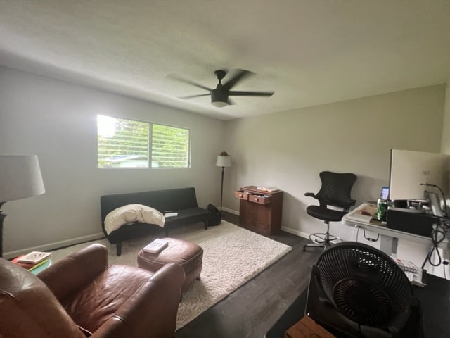 office space featuring ceiling fan and wood-type flooring