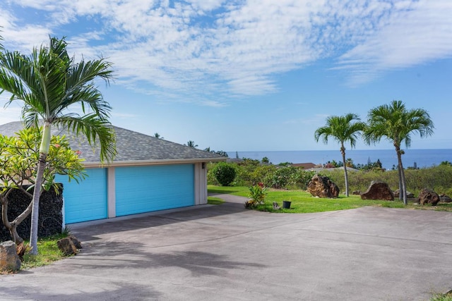 garage featuring a water view