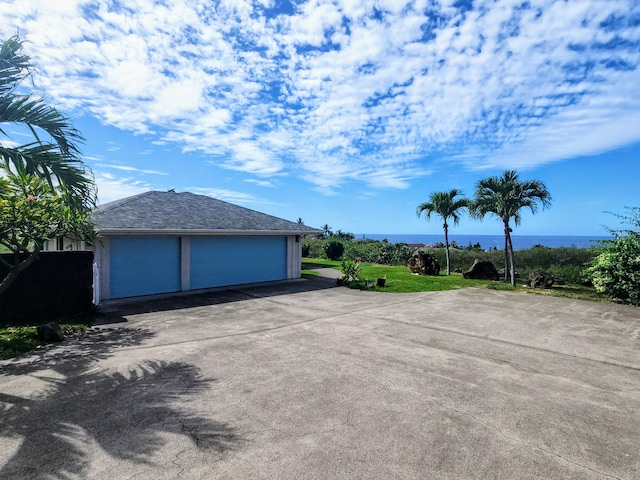 garage featuring a water view