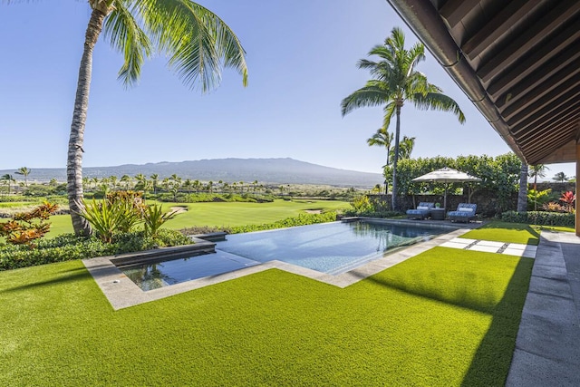 73-4839 Maia Loop Unit 40, Kailua-Kona, HI 96740 - view of swimming pool with a yard, a mountain view, an infinity pool, a patio, and view of golf course