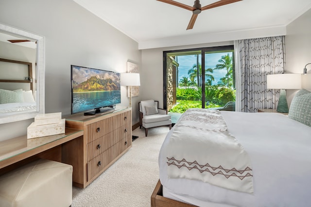 bedroom with ceiling fan, light colored carpet, and crown molding