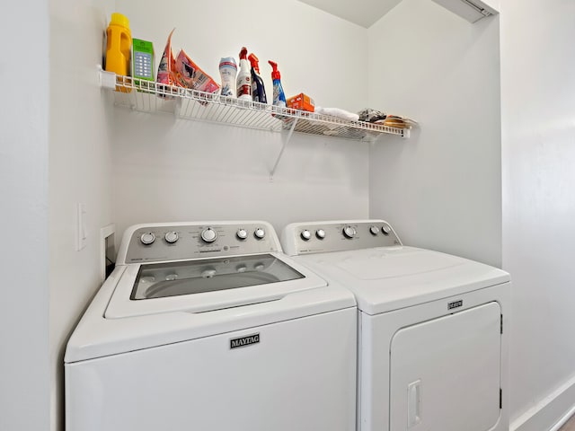 laundry room with washer and dryer