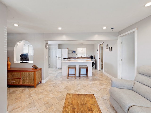 living room featuring washer / clothes dryer