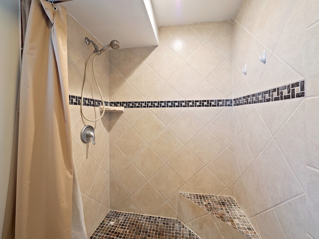 bathroom with a shower with curtain